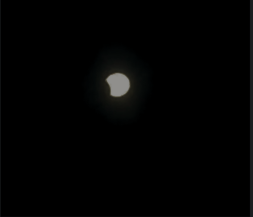 Got a last-minute view of the solar eclipse this morning at 6:20 AM. I was able to capture these on my phone through a pair of solar eclipse glasses. 

What a beautiful way to start the morning!