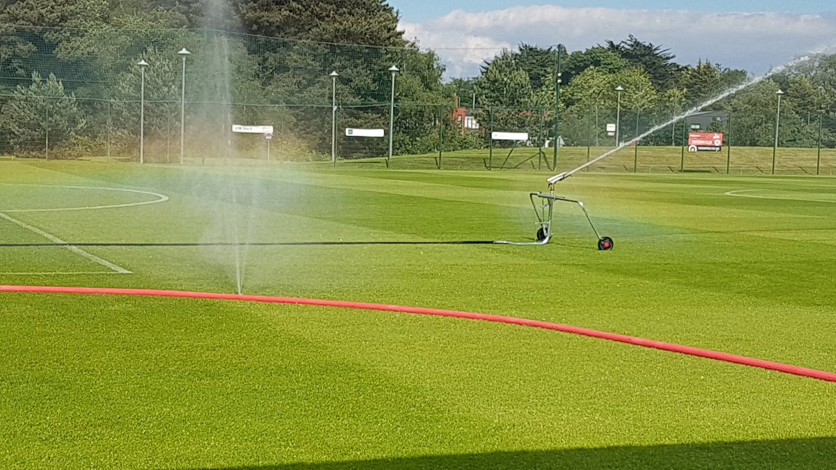 Gazgrass's tweet image. Big effort from the staff getting pitch 1 @QueensSport ready for tomorrow's IFA U17 Womens double session  training / match ⚽️.  Down to one sprinkler but one of those day you don't mind a leaking hose but looks like a call to @Aquaturf_ #extracoverage 🌖☔