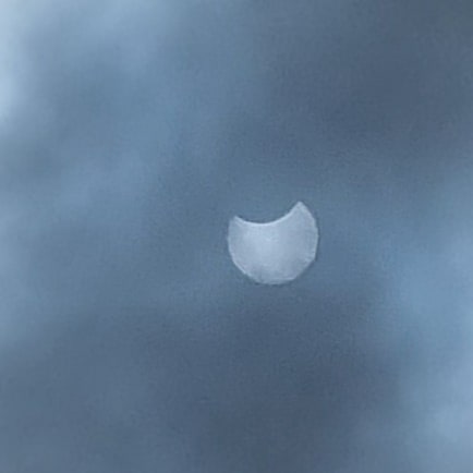 KimBCrisp's tweet photo. A few shots through the clouds #Eclipse2021 #SolarEclipse #solareclipse2021 #AnnularSolarEclipse #Eclipse https://t.co/k0Ub28f3lV