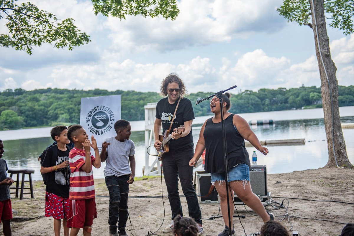 Found this gem of a photo from when @philcookmusic performed for the Boys & Girls Club of Newport County. By the end, Phil had every camper singing and dancing along with him. #nffmusiceducation 📷= @brianlimaphoto