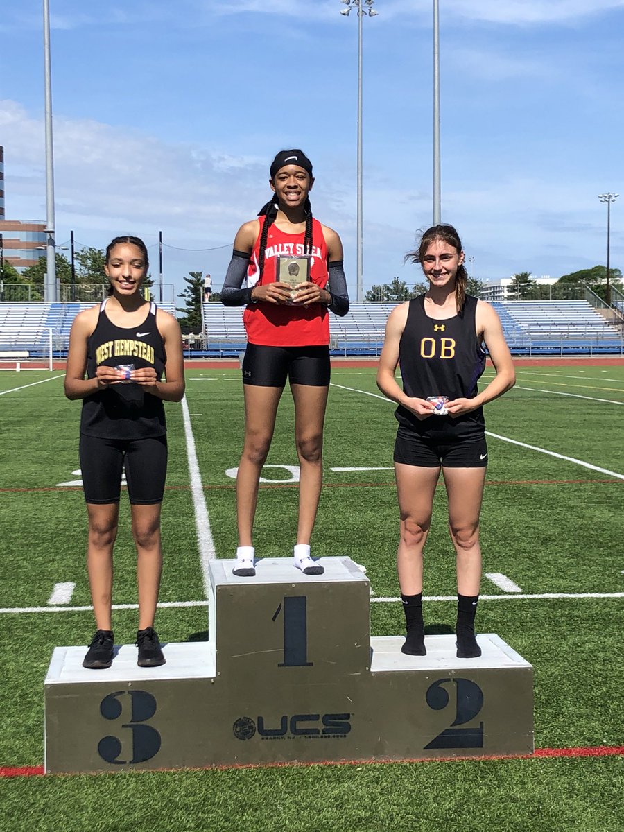 The girl in black (and purple and gold). 2nd in county by .01 seconds