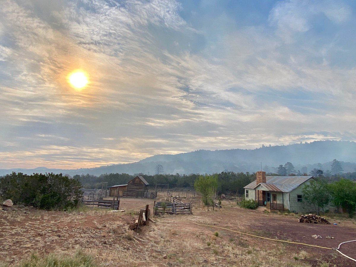 bobthe1dog's tweet image. A Smokey Cedar Ranch this morning has so far survived the #slatefire.  Photo by Billy Cordasco of Babbitt Ranches