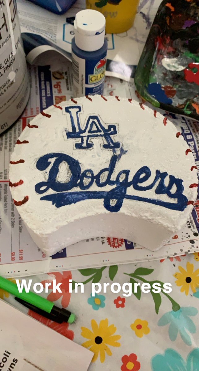 TeachM_ESL_SAHM's tweet photo. Redid an outside porch rock for my father in law 💜 #ladodgers⚾️ #baseball #painting #artist #baseball #rockpainting https://t.co/P6DMFIqiAp