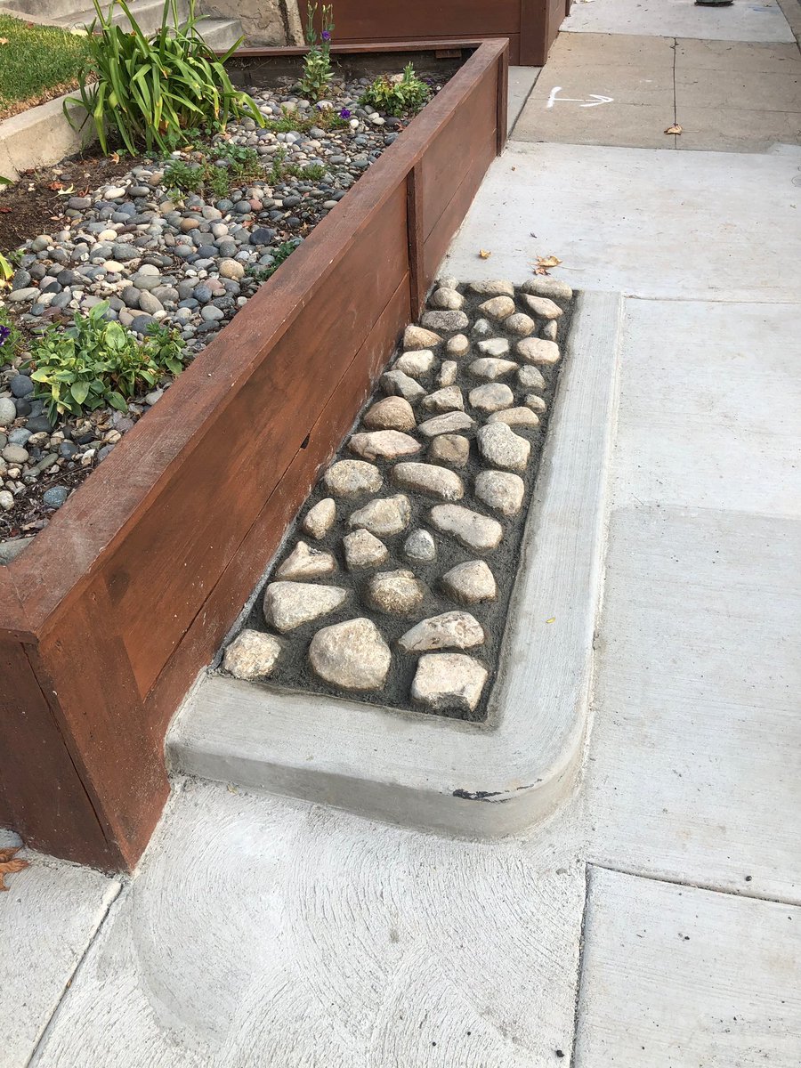 nextphasela's tweet photo. @awalkerinLA These mini planters are up and down Loleta in Eagle Rock. Something to do with making up grade I guess, but very mysterious. https://t.co/1990L8FUx5