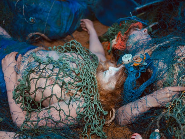 The Independent on X: 'Dead mermaids' tangled in trawler nets appear on  beach in Ocean Rebellion protest #G7Cornwall #G7  /  X