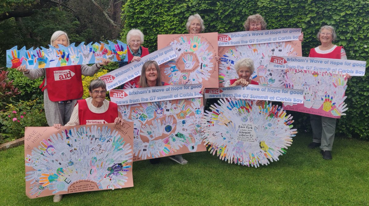 Go girls!! Brixham's #waveofhope which is now displayed in shop windows around the town for all to see - <a href="/christian_aid/">Christian Aid</a> supporters demand that we must #crackthecrisis at the G7 this weekend