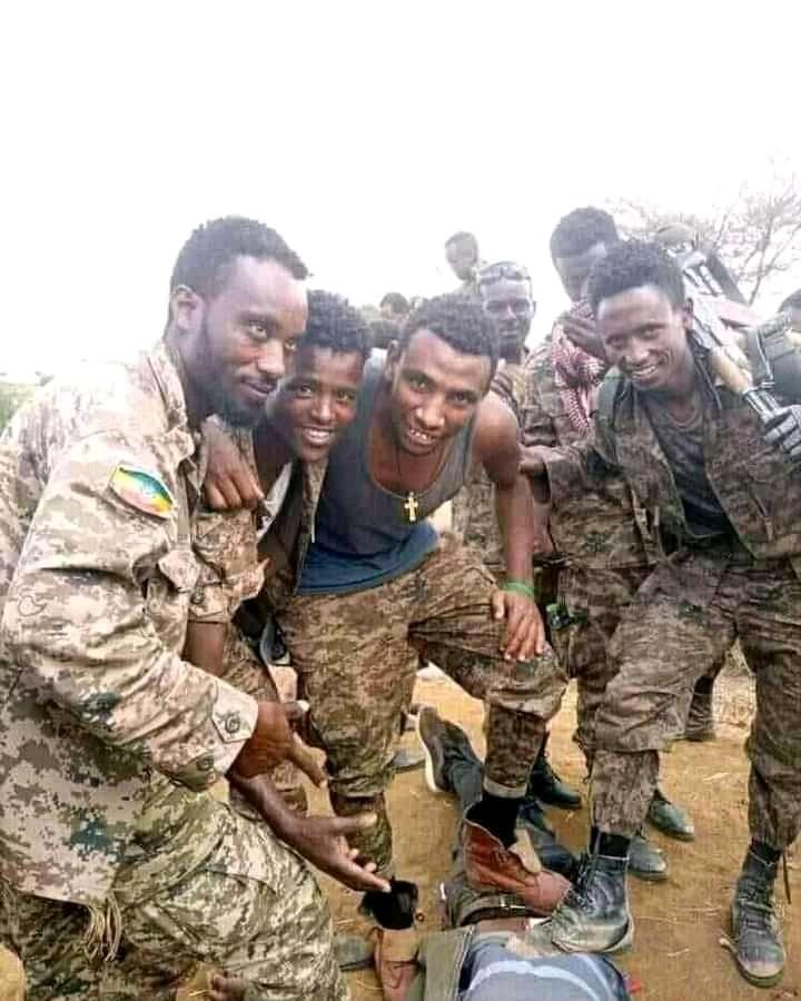 JGamtaa's tweet photo. Ethiopian Soldiers Kills Innocent civilians and take photograph of themselves with the dead Body, The whole world must act on now, No more press release, the Peoples of Oromia, Benishangul, Omo, Kimant and Tigray requests for immediate Action!! https://t.co/2AXsYEaxUQ