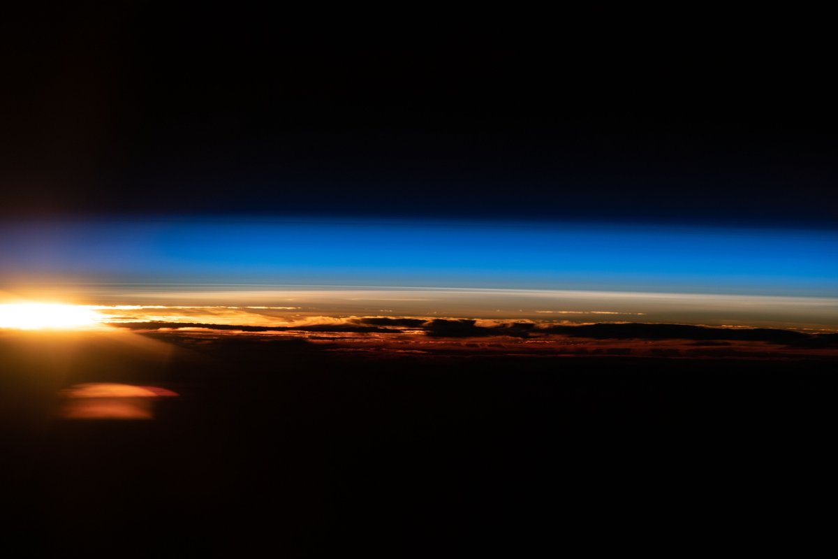 Earth, 20 May 2021   An orbital sunrise is pictured from the International Space Station as it soared 265 miles above the Indian Ocean off the coast of Western Australia. [OS]