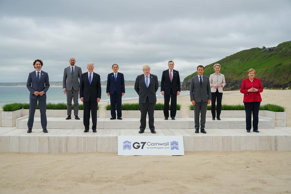 G7 leaders pose for a group picture.