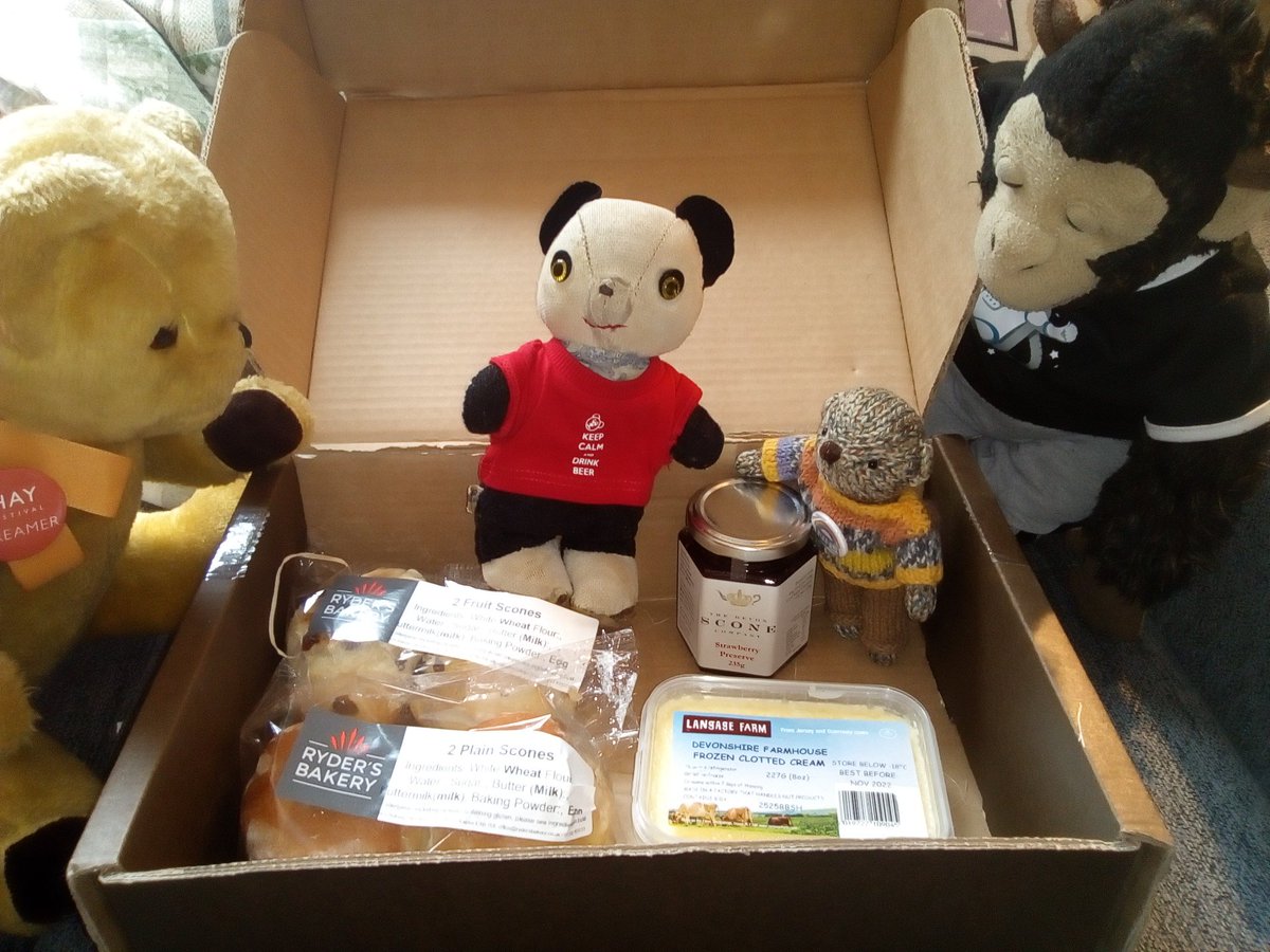 Pub_Panda's tweet photo. We got very exciting post today!! To celebrate the humans having their 1st vaccines yesterday, we received a very yummy @devonheavenuk Cream Tea to share in the garden (although we ate most of it!). #CreamFirst #JamSecond https://t.co/QffP0WmzVS