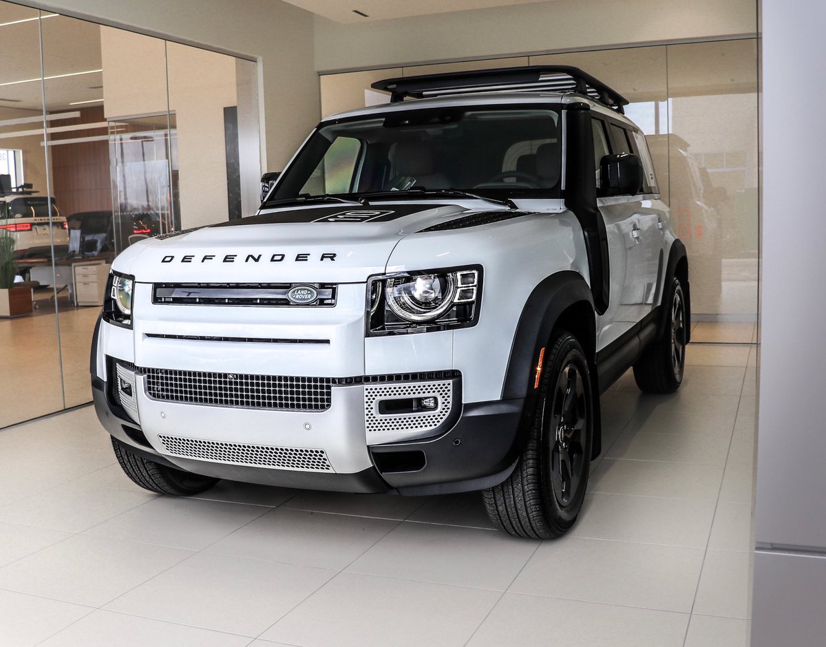 Roof rack? Check
Snorkle? Check
Mud flaps? Check 
This Defender is ready for adventure.