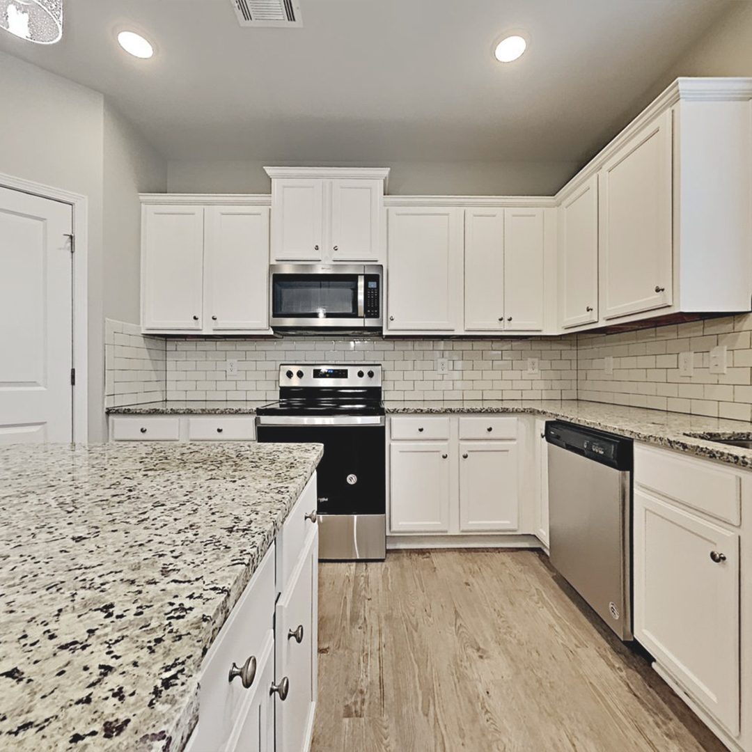 Step inside this modern four-bedroom Atlanta home to find the kitchen of your dreams. For more homes in your area, visit our website. bddy.me/2RM7ziJ