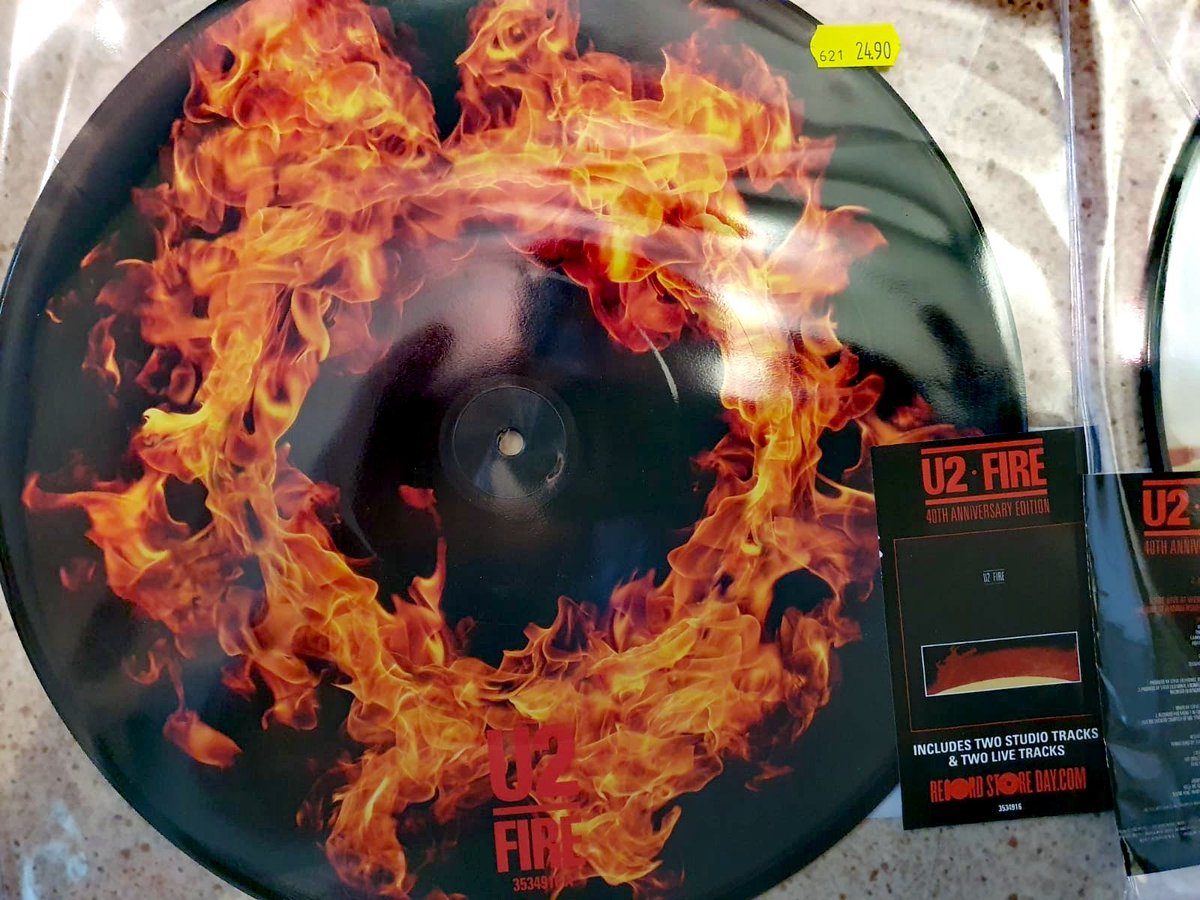 U2tour's tweet photo. At this year's #RecordStoreDay @U2 is on fire
Have you already picked up your copy? (Thank you to legendary #michellerecords in Hamburg)
#U2 #U2Fire #RSD2021 https://t.co/DEYMSPY5Sz