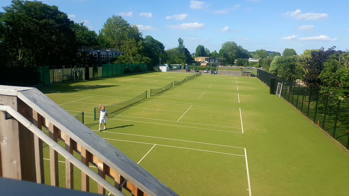What a day of sunshine tennis!  Winding down the nets after our club American doubles tournament. Congrats to Marcus and Liz for highest scores. Everyone relaxing for tea time treats on the terrace of our beautiful clubhouse pavilion