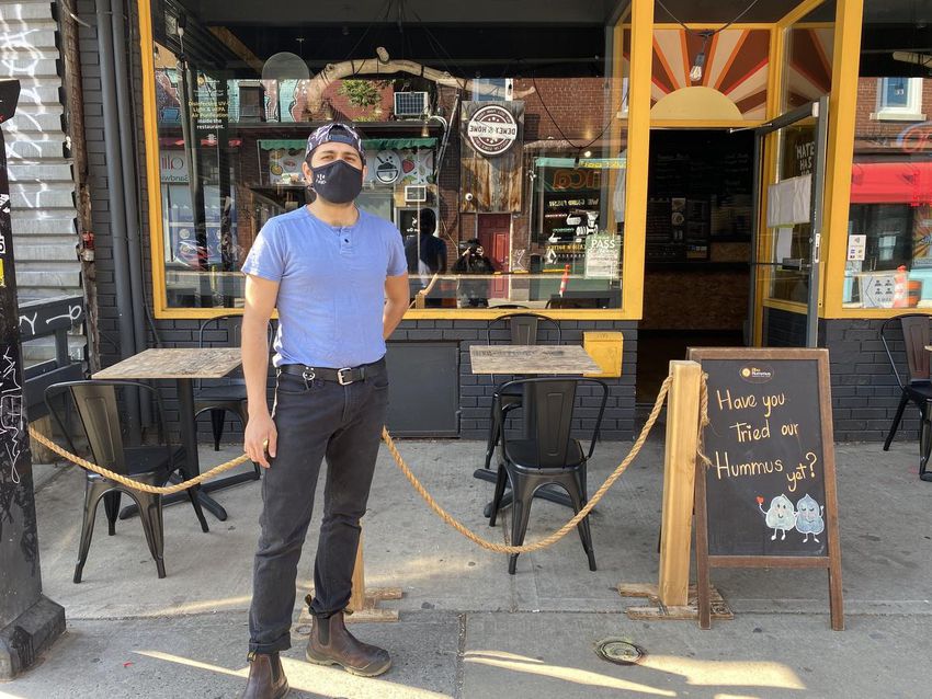 TorontoStar's tweet photo. Burgis Wadia, manager of Abu Hummus in Kensington Market, said having people eat "right outside our restaurant" is "huge." https://t.co/8CGOhTFSp9 https://t.co/gRBbWCNX07