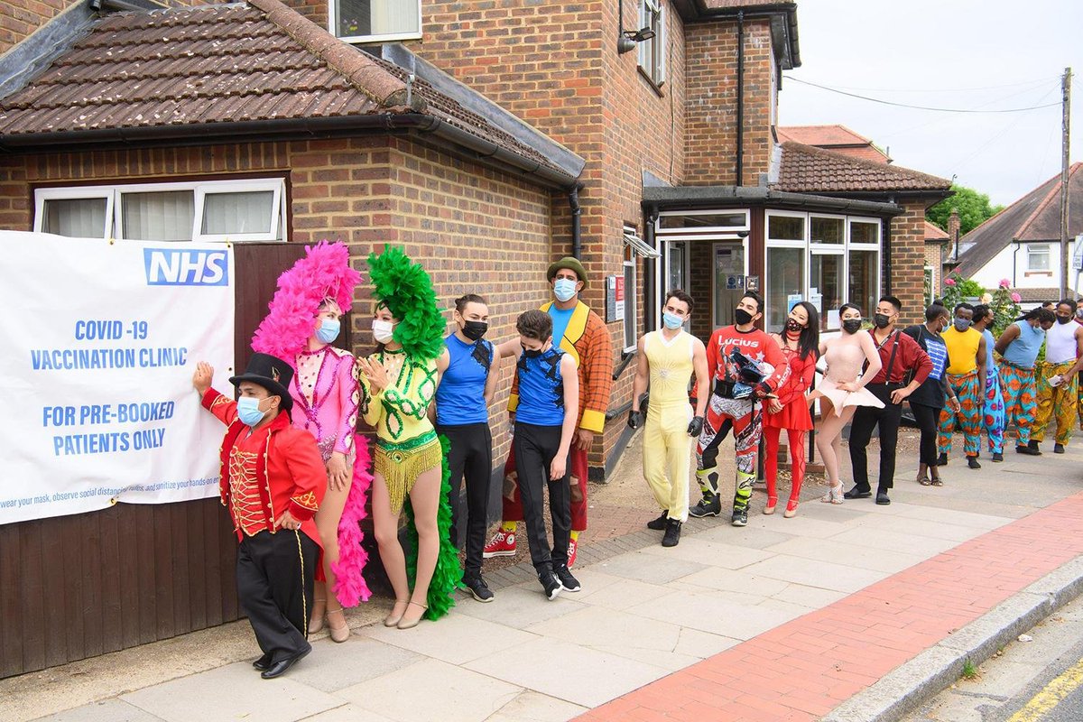 Circus performers line up to get a COVID vaccination in London. Photo by Matt Crossick.