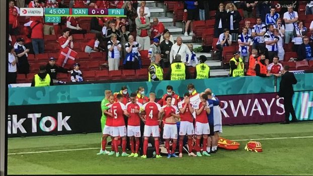 TheMightyDeol's tweet photo. Much respect to Team #Denmark , shielding their player Christian Eriksen… my thoughts and prayers to him and his family. Hopefully he is okay! #Euro2021 #Eriksen https://t.co/m5FSeaf2sU