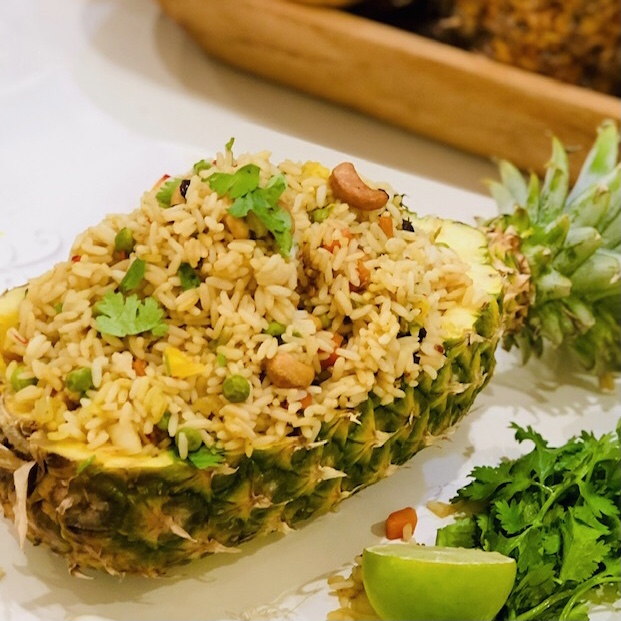 This classic Thai pineapple fried rice is perfect as a main course or as a beautiful side dish to any of your summer meals. Find the recipe by <a href="/jaxvegancouple/">JAX Vegan Couple</a> FREE in The Strength Issue at vegworldmag.com/magazines/the-…