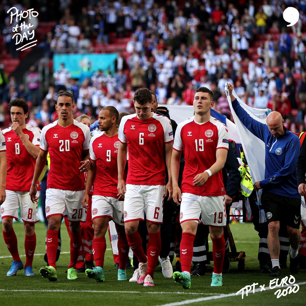 Our #EURO2020 Photo of the Day: <a href="/dbulandshold/">Fodboldlandsholdene 🇩🇰</a> players shielding Christian Eriksen as he gets taken off the pitch. #TPTxPOTD