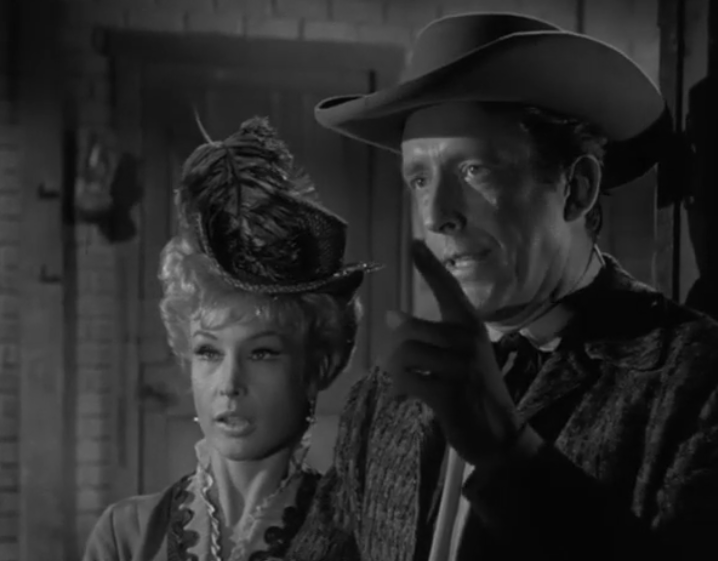 Rawhide, Season 7, Episodes 7/8, Damon's Road. Usually Rowdy gets into a fight, here Gil Favor (Eric Fleming) has a drag-out fight with guest star Friz Weaver while Barbara Eden looks on. Who wins? At end of the episode, a battered Favor yells out,