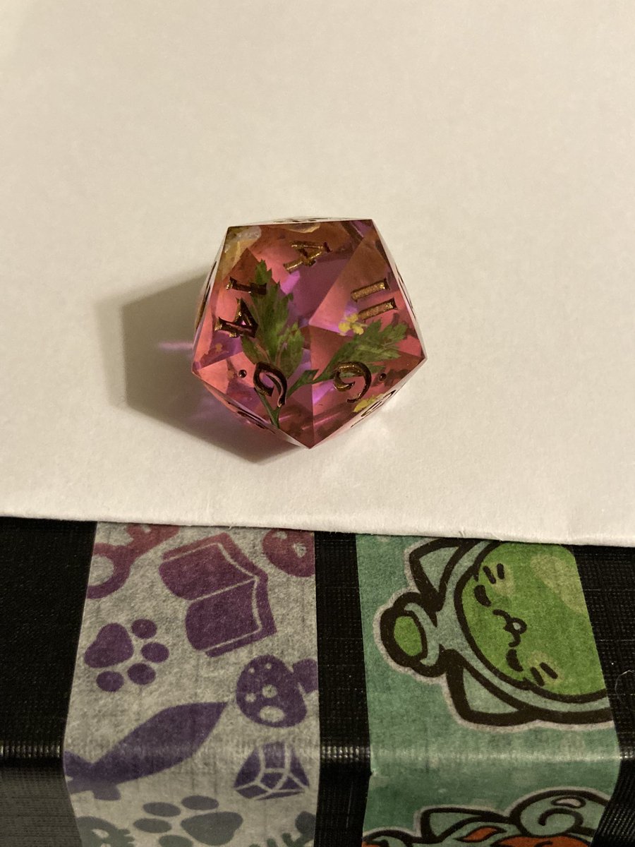 thelaurakremer's tweet photo. I just got this awesome die from @noctisresin All the way from Canada!!! Such a magical land! I got to pick the color of the ink and I love how it has different colors from different angles! Yay thanks! #nofilter #floraldie #customD20 #theprettiest https://t.co/phWxchUlFT