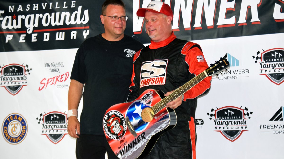 RacingAmerica's tweet photo. Bill Burba added a guitar from Nashville @RaceFairgrounds to his trophy collection on Saturday night with the #ModsofMayhem.
Read more: https://t.co/6KYgGQKaIo https://t.co/EFGsDQoUzg