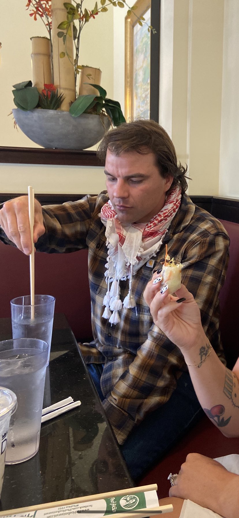 Here s my brother picking out an ice cube with his chop stick to eat. happy birthday 