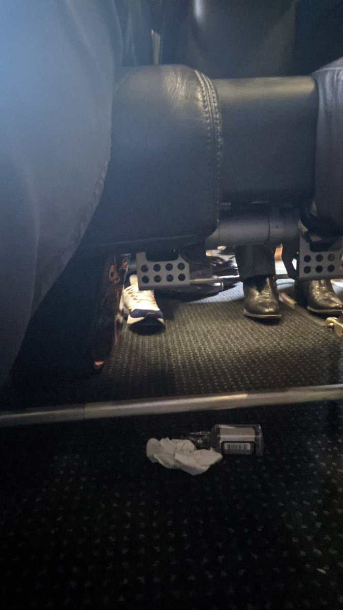 macho718's tweet photo. @AmericanAir @aairwaves worst FirstClass experience ever.  Seated in seat 2F on flight 5999 and there is trash in my seat and under.  So much for COVID cleaning.  That and the second class check in service.  Next time I should just fly @Delta https://t.co/9C23LZAUeM https://t.co/IsKfljdXPs