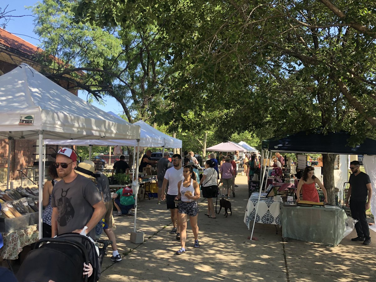 Happening now!  Farmers market at the park