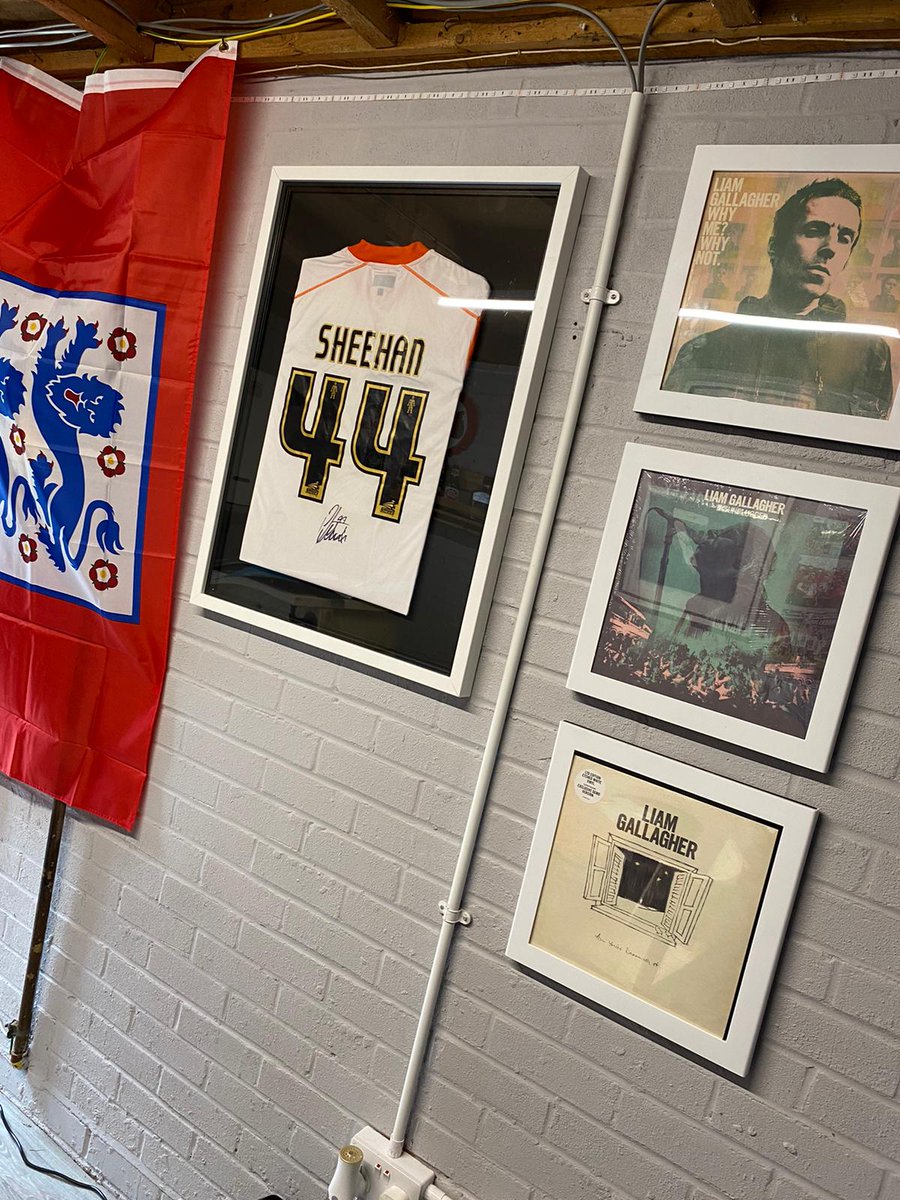 Signed @sheezdogg @LutonTown framed shirt takes it place on the wall in the home-bar conversion project being suberbly managed by @Josh_Duffy99