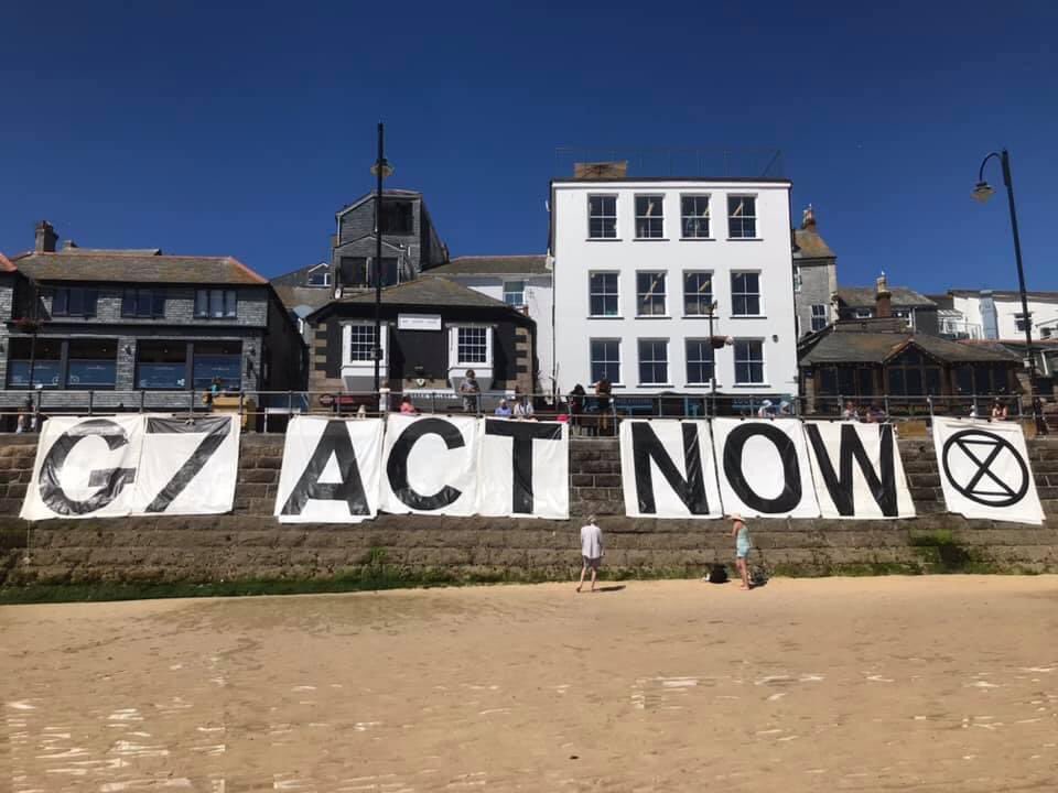 audleyburnett's tweet photo. Extinction Rebellion Carmarthen were up early this morning to drop a banner outside the Carbis Bay Hotel, where the leaders of the G 7 are staying.
We are still drowning in empty promises and the G7 MUST ACT NOW @XRebellionUK @XrCymru #G7 #g7wave https://t.co/hdhZ4rqUow