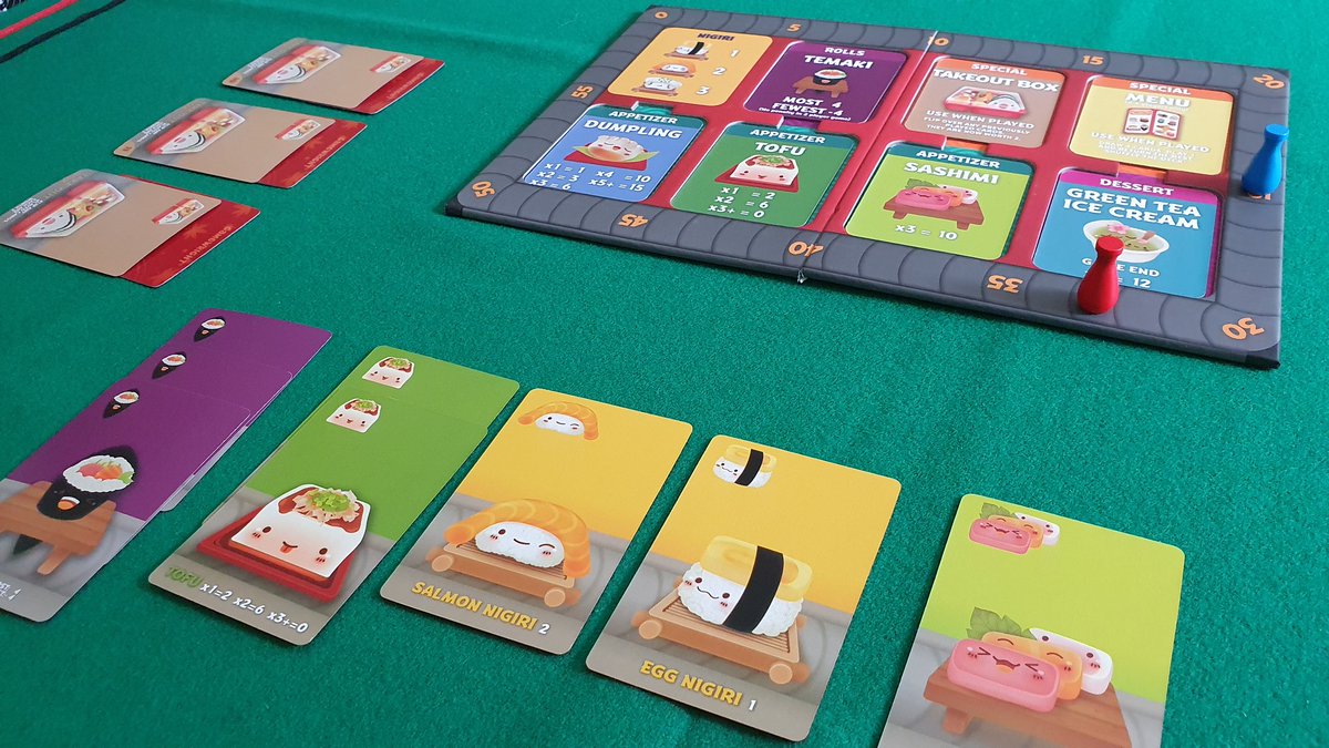 The last round of a two player Sushi Go Party game. Red is winning.