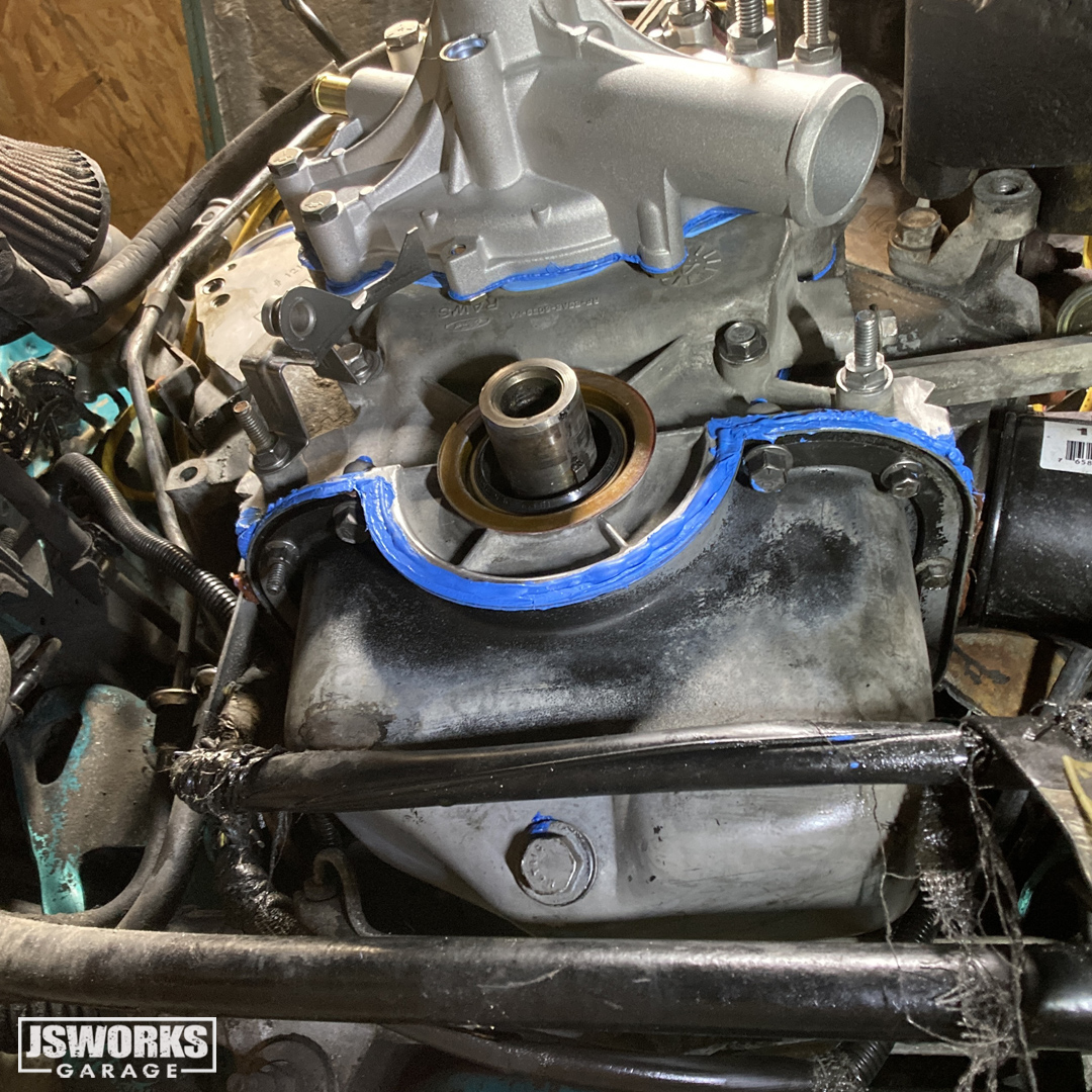 jsworksgarage's tweet photo. I cleaned all surfaces, put a thin layer of silicone on the inside pan, &amp; laid it on thick in the center of the timing cover. With the cover on (wet), I hand tightened the bolts, &amp; waited 45 minutes for the silicone to “form” a gasket. Then tightened to the correct torque specs. https://t.co/PoJXFXE4s0