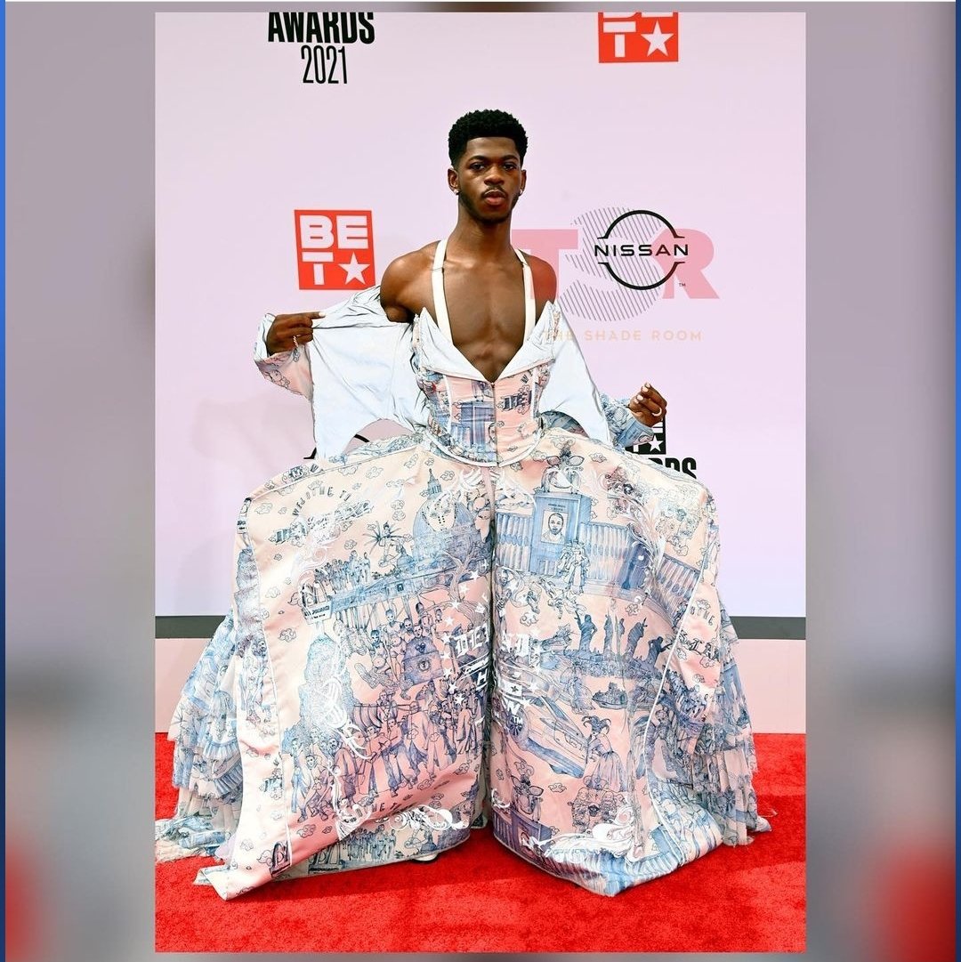 Isn't it interesting how the white rapper is allowed to keep and portray his masculinity to be invited into white owned Black spaces.

But the Black rapper has to be moist and flamboyant in order to get attention from the dominant society.

THIS is what a Race War looks like.