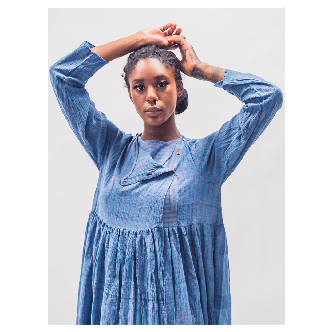 KapadeShop's tweet photo. Round neck, overlapped, gathered,  floor length dress in crushed fabric, fastened at the waist and neck. Natural dyed in lac and indigo. 

model @art.by.nalin⁠
beauty captured by @salas0869⁠

@makutextiles #khadicotton #fashiondesigner #slowfashion #onlineshopping @kapadeshop https://t.co/WlkNgZwq9R