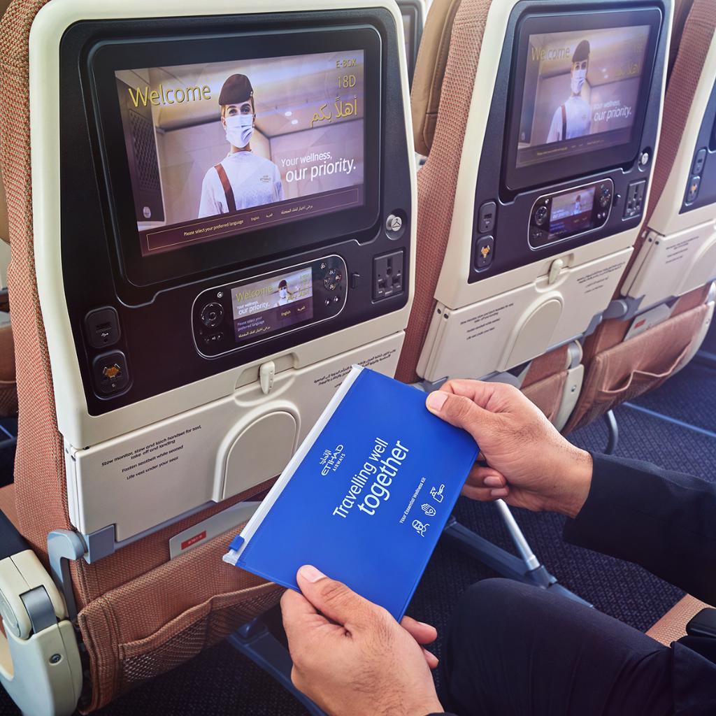 etihad's tweet photo. Face masks, hand gels and gloves are part of every wellness kit handed in Etihad Economy to ensure that you have a worry free journey while flying with us. https://t.co/lHcVmk4WM1