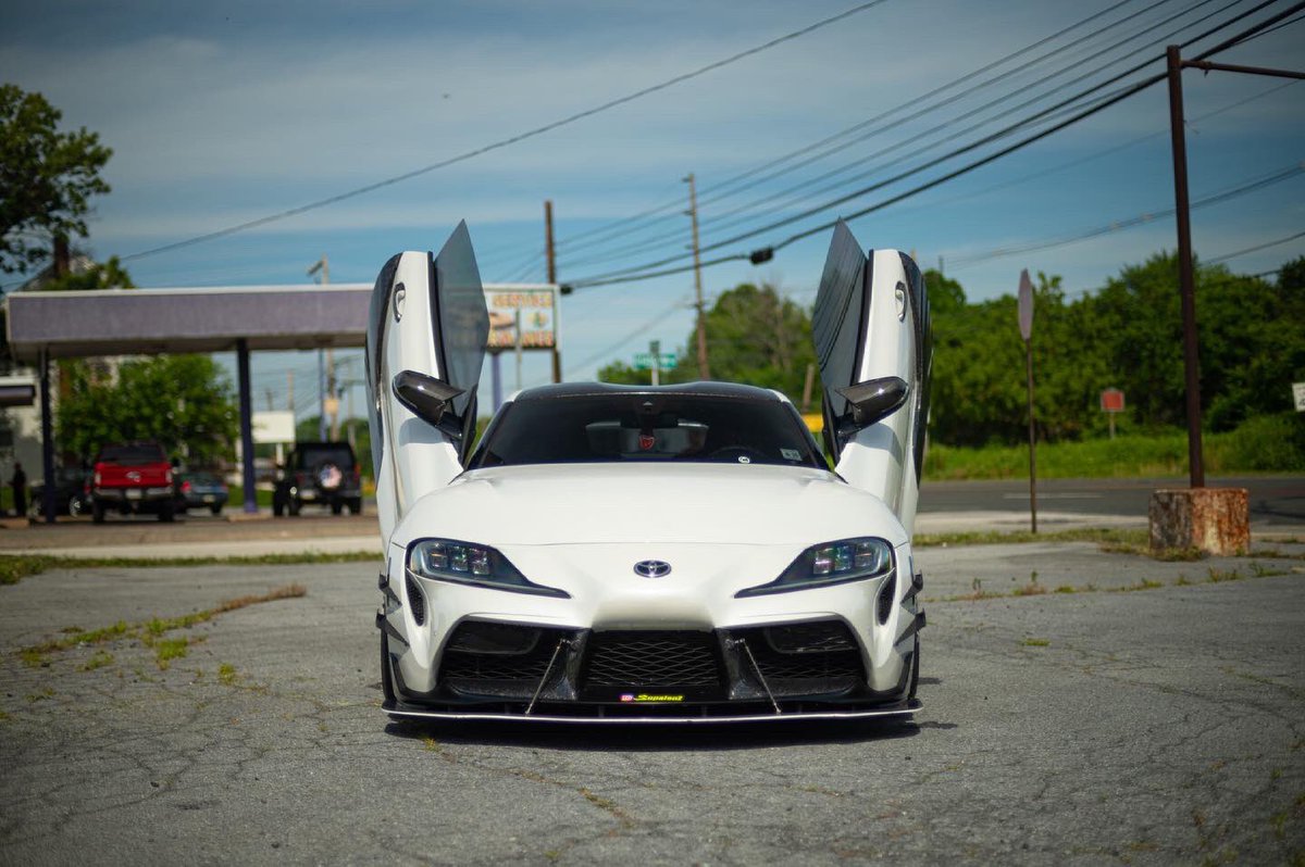 RoyalCustomsLLC's tweet photo. Lambo doors on an A90 Supra?! 

What are your thoughts? Should the Mk5 have come from the factory like this? https://t.co/CsgO2kGNkc