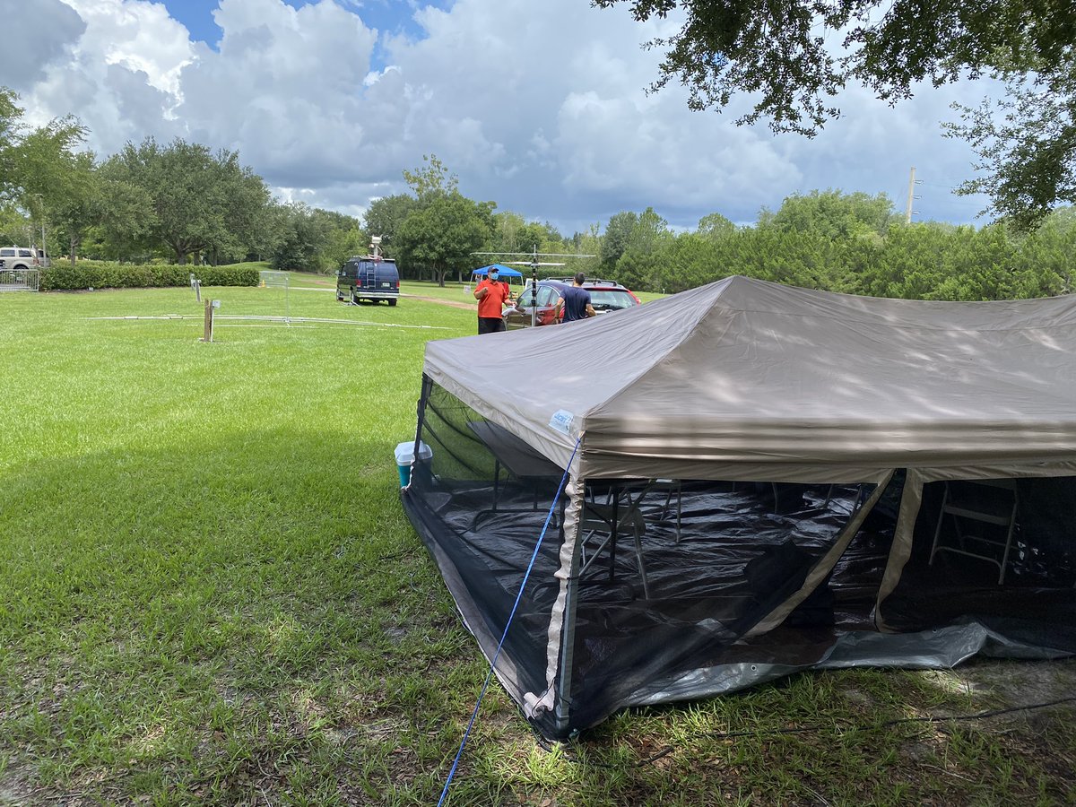 WD4WDW's tweet photo. @NWSMelbourne thanks for the heads up yesterday. We see the clouds rolling in and thunder in the distance. Antennas are down, tent is staked and lowered. Going to ride out the storm in our sack and wait for everything to pass. Not the best start to #arrlfd but at least safe. https://t.co/1eDV9jfPzO