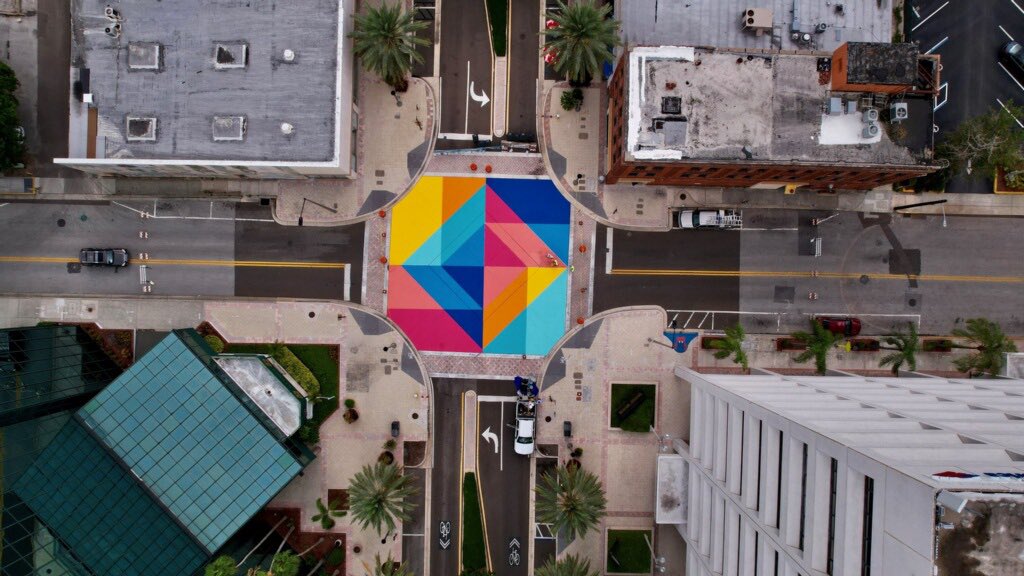 Colorful, geometric mural on the intersection of Cleveland Street and Garden Avenue in downtown Clearwater by artist Cecilia Lueza
