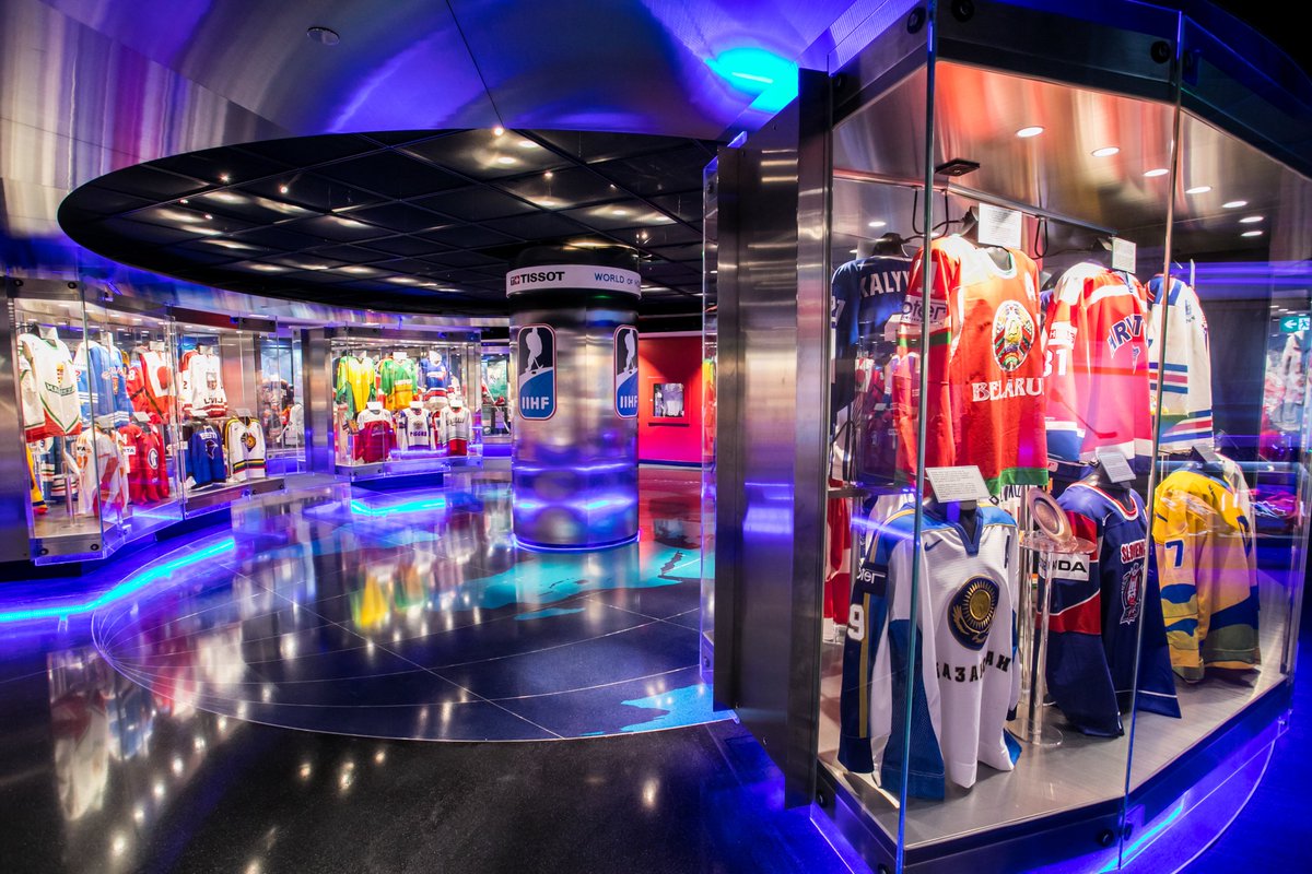 The Tissot World of Hockey Zone in the Hockey Hall of Fame features jerseys and memorabilia from teams and tournaments from around the globe! Jerseys fill showcase boxes that create a circular exhibit with a pole featuring the IIHF and Tissot logos at the centre. 