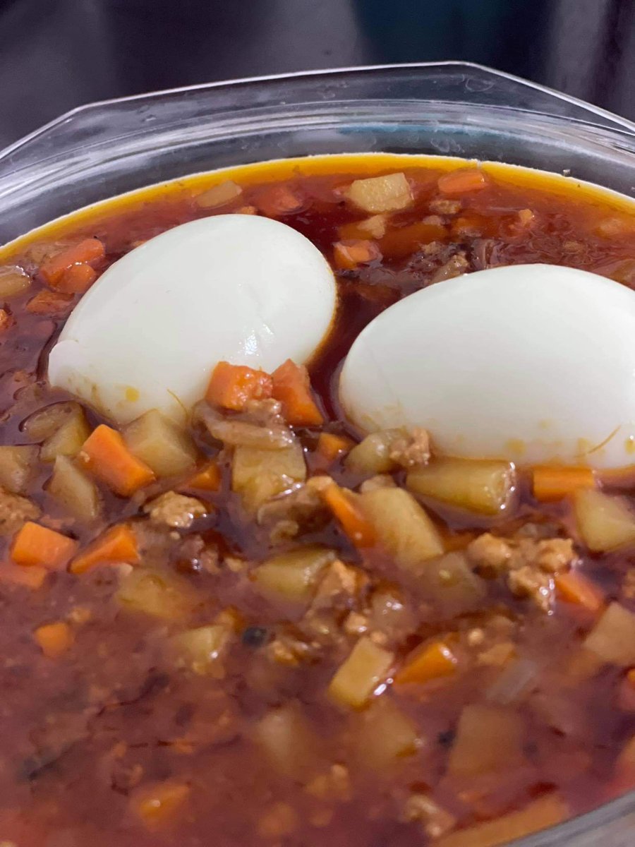 Pinoy style ginisang mince pork in tomato paste and carrots and potatoes topped up with boiled eggs