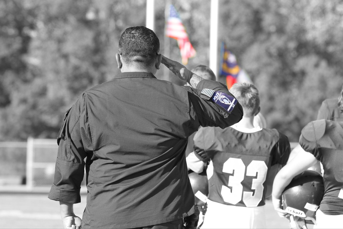 cuttypix's tweet photo. One of my all time favorite pictures from a few years back.  Very thankful for our police. https://t.co/S3gWkkUA0e