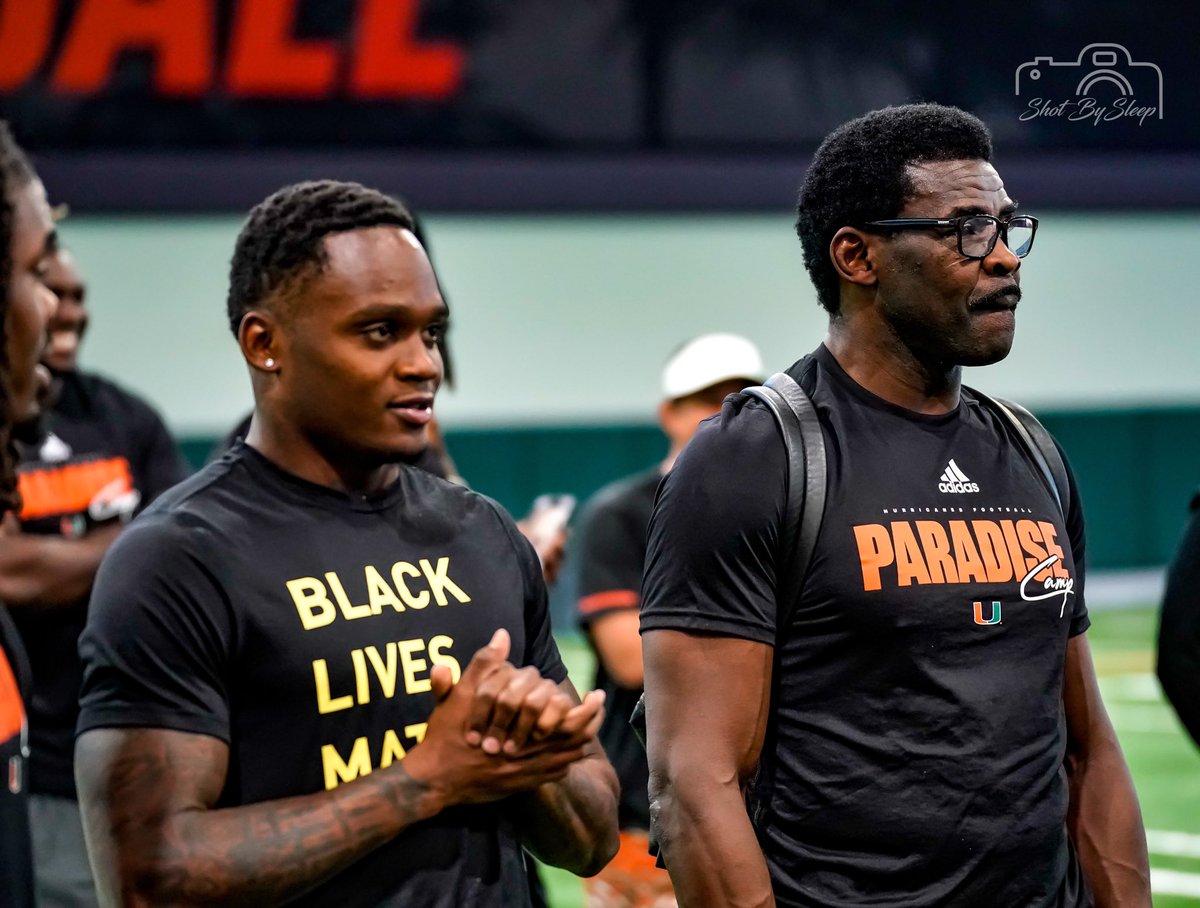 SleeperAth1etes's tweet photo. #StThomasAquinas HS (FL) alums former #Miami Michael Irvin (@michaelirvin88) & current #Hurricanes WR Mike Harley Jr. (@MikeHarleyjr) at #ParadiseCamp #ShotBySleep https://t.co/Zgxpny12w9