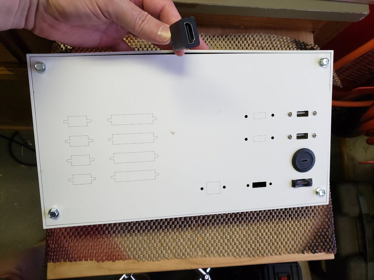 mark_lawler's tweet image. The hot glue finally congealed around the SD card extenstion so I buttoned up the back case for now. have a panel mount HDMI connector on the way and will add RS232 DB9 connectors later. #PiDP11 #pdp11 #RetroComputing