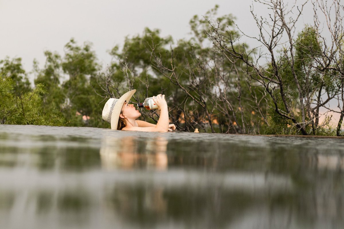 All a girl really ever needs is a good swimming hole and an even better whiskey.