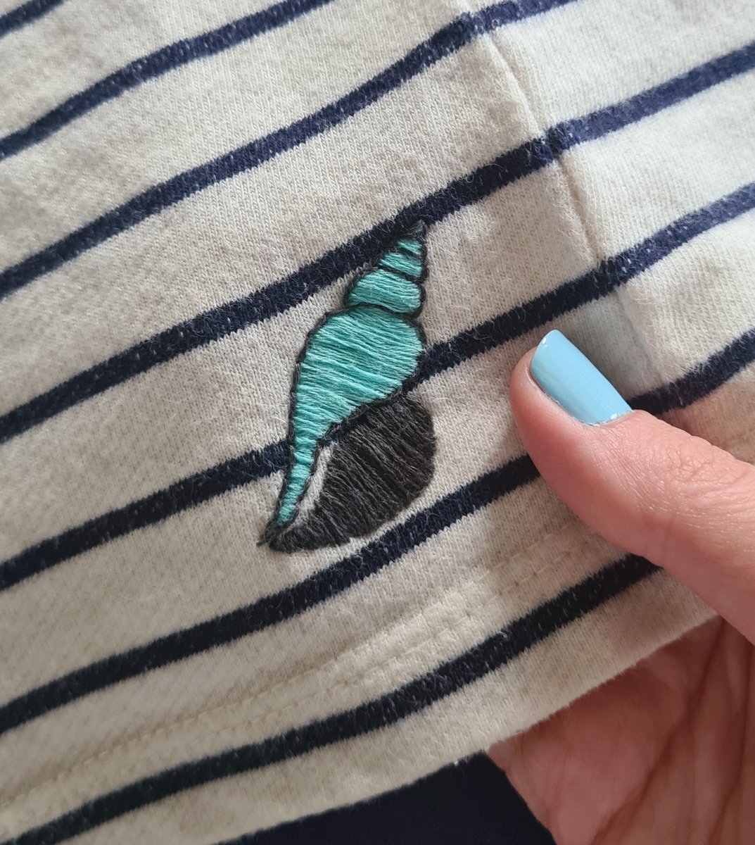 🐚 Having a play around with some new threads (and a shell from my Ocean kit) because I have approximately 574730285 identical stripey tops 🙃 #embroidery #craft