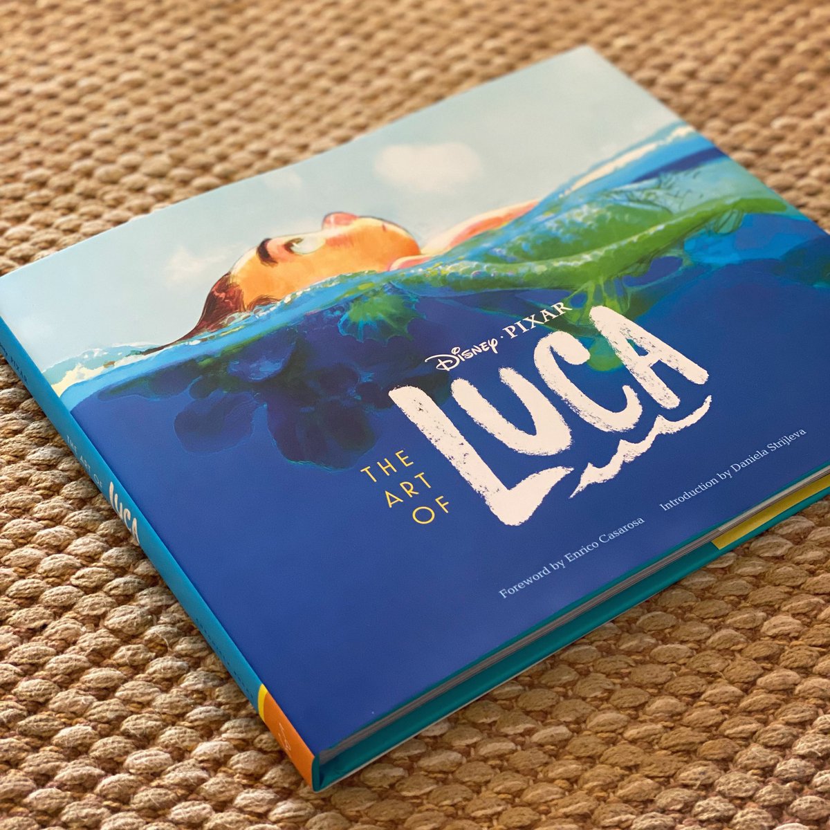 This book is SO beautiful! Congrats @FirstNameDani @joshholtsclaw @donshank @paulabadillaart Deanna Marsigliese, Jennifer Chang & the whole art team! I can stop paging through this & want everything on my walls! 💙 #pixarluca
