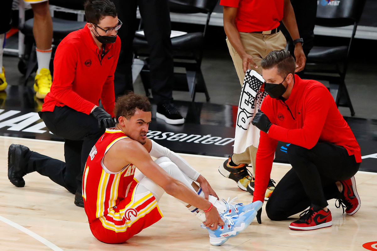 Bucks top Hawks after Trae Young hurts ankle by stepping on ref