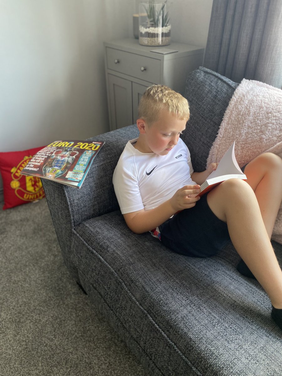 Happy boy reading You are a Champion <a href="/MarcusRashford/">MR14</a>