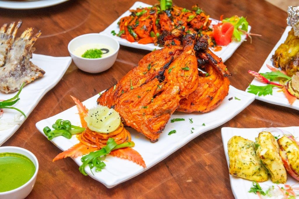 Bhatti Ka Murgh is an irresistible, spicy grilled chicken marinated in roasted onion and cashew paste with yogurt and other flavorful spices. The taste is very close to Tandoori Chicken but slightly different because of the roasted onion.

#Food #GourmetsTravelGuide #Kebab